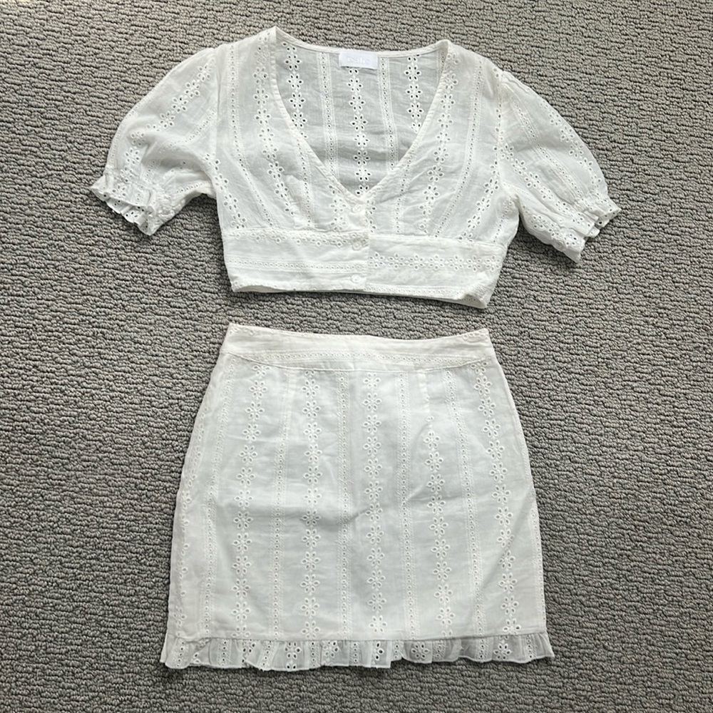 White lace matching crop top and skirt